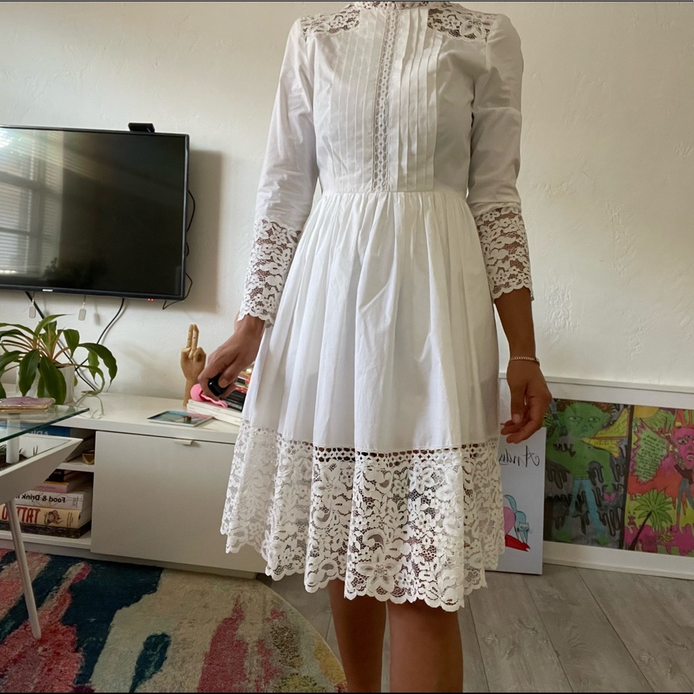 Beautifully intricate Sandro Paris dress. Nice material.